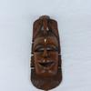 Masque africain en bois sculpté. - Photo 1