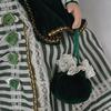 Grande poupée en porcelaine - robe verte - Photo 2