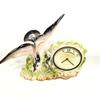 horloge en céramique avec sculpture d'oiseau - Photo 1