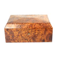 Boîte à bijoux en loupe de bois - Photo 1