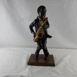 figurine africain jouant du saxophone  - Photo 0