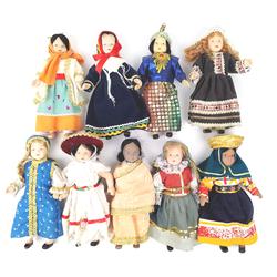 Collection de 9 poupées du monde- corps articulé en porcelaine - h:21 cm - Photo 0