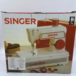 Machine à coudre enfant- point noué - "Singer" - 7 ans et +  - Photo 0