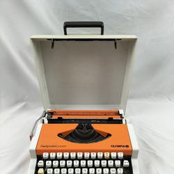 machine à écrire dactymétal junior Olympia (orange) Vintage - Photo 0