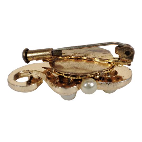 Broche dorée en forme de tourbillons avec petites perles - Photo 2