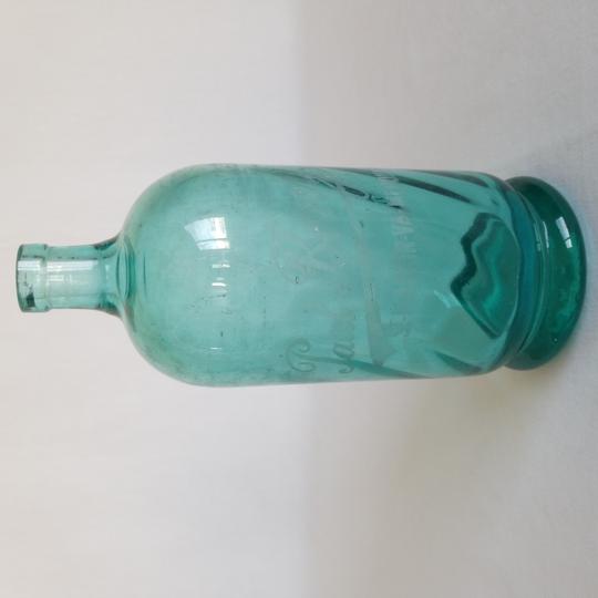 petite bouteille à limonade ancienne en verre bleu 
