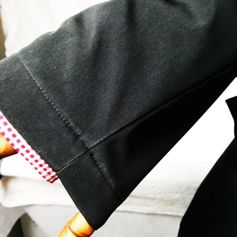 Yves Saint- Laurent Blouson zippé noir en acétate YSL - Taille L - Photo 1